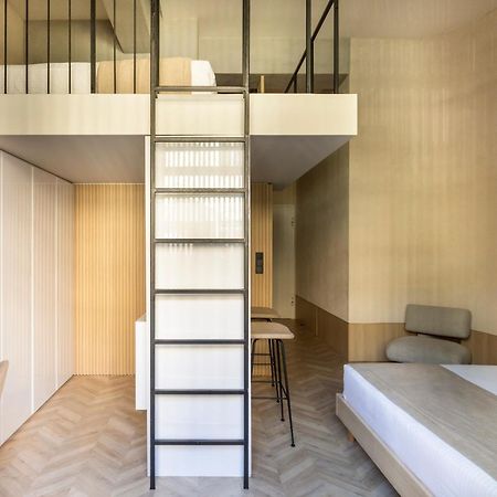 The Newel Psychiko Hotel Athene Buitenkant foto A ladder leading to a mezzanine